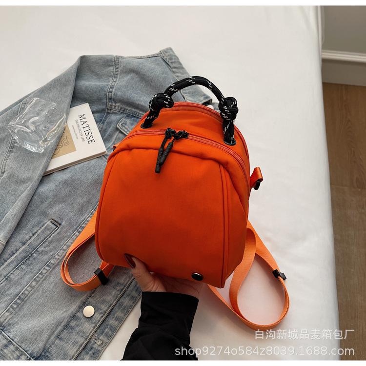 

2025 new fashion small backpack popular backpack student shoulder bag travel bright color backpack crossbody waterproof оранжевый
