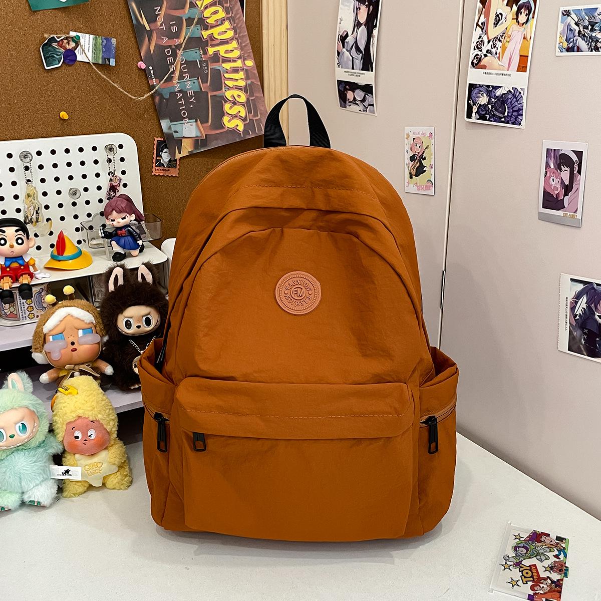 

Туристический рюкзак новый корейская версия школьная сумка студенческий рюкзак старшеклассник ученик средней школы однотонный простой рюкзак коричневый