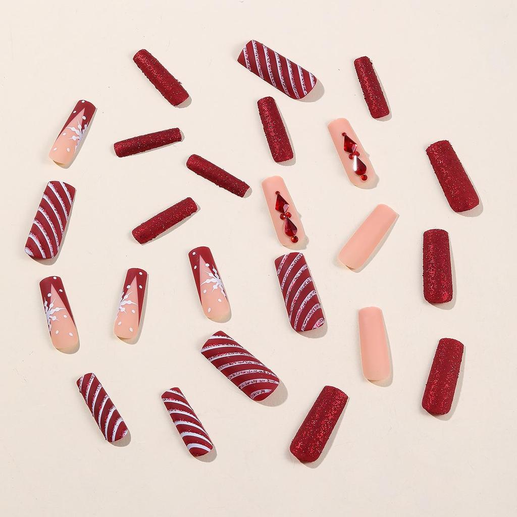Świąteczne Czerwono-Białe Paskowane Paznokcie Press-On z Brokatowymi Płatkami Śniegu i Cyrkoniami