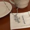 Trendy Double Cross Inlaid Diamond Clavicle Necklace – Vintage Distressed Chain, American Hip-Hop Style.