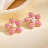 Fashionable Titanium Steel Pearl Flower Stud Earrings for Women: Stylish Stainless Steel Hollow Design in Cold Style.