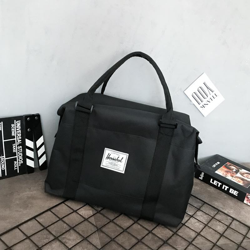 

Дорожня сумка Жіноча портативна, легка та проста сумка для багажу Дорожня сумка великої місткості Водонепроникна сумка через плече Сумка для фітнесу He is a size 16. чорний