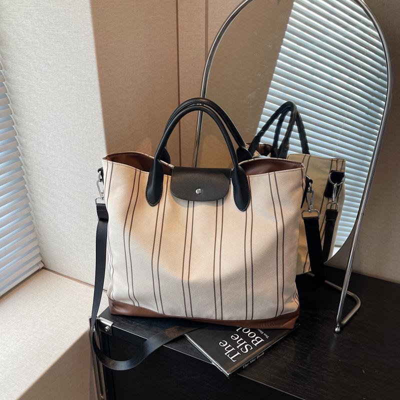 

Вместительная повседневная модная сумка-тоут женская новая нишевая дизайнерская полосатая на плечо кроссбоди сумка для поездок бежевый