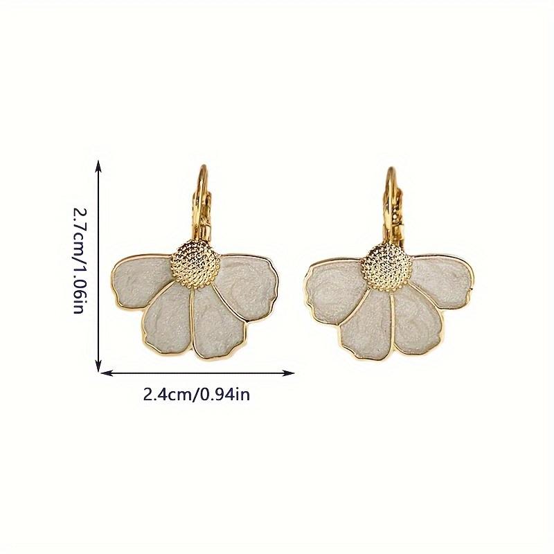 A pair of elegant French-style floral drop earrings, featuring a delicate four-petal flower design, perfect for everyday wear, parties, and vacations.