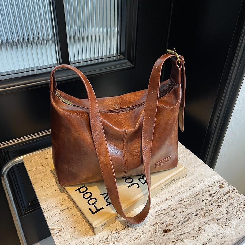 

High-end retro large-capacity bag women s 2025 new casual commuter tote bag simple shoulder crossbody bag коричневий
