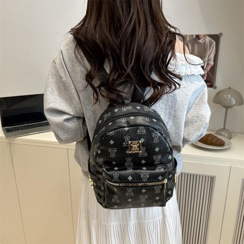 Mode trend avslappnad textur ryggsäck vår nya nisch design damväska enkel ryggsäck