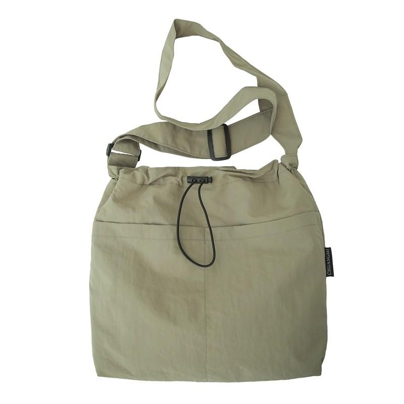 Nylon Casual Bucket Bag For Travel And Leisure With Drawstring Closure For Men And Women