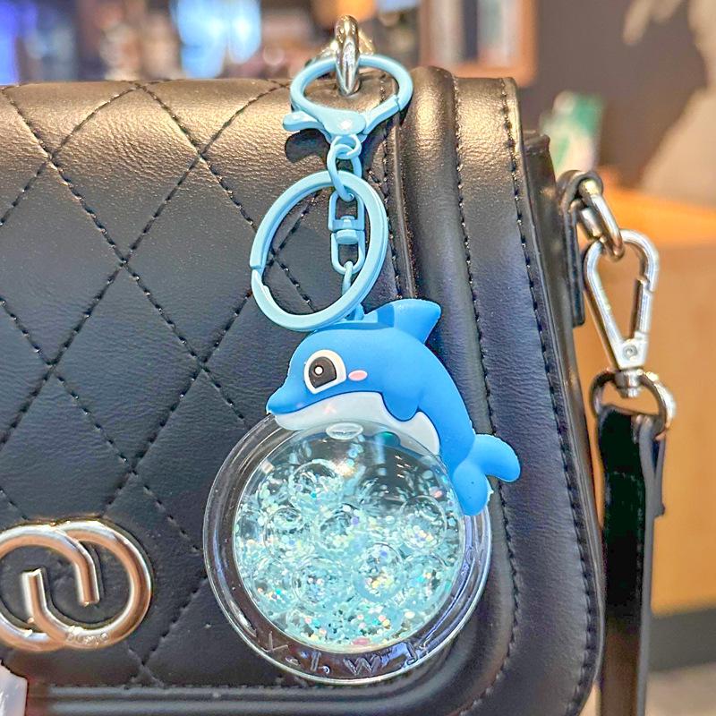 2025 New Oil Flowing Sand Dolphin Keychain: Cute Marine Animal Backpack Pendant for Girls