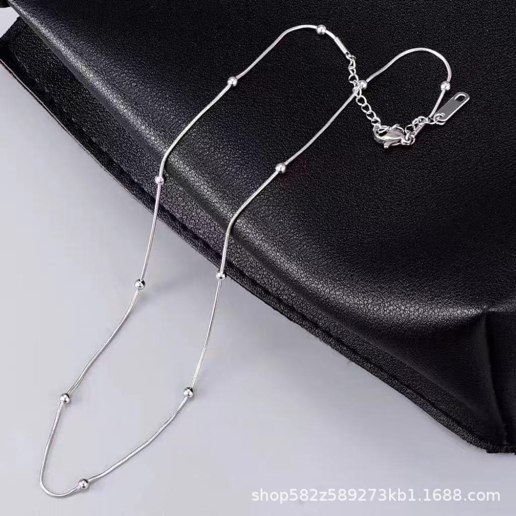 

Ожерелье из розового золота и титановой стали с бусинами на ключицу — универсальный и невыцветающий дизайн для женщин XL062