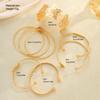 Elegante Vintage Hohllinien-Streifenblumen-Drehmetall-Armreif-Armband-Sets für Damen Tägliches Tragen Party Hochzeit Urlaub Schmuck
