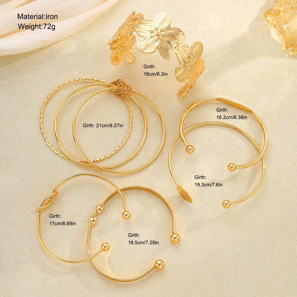 Elegante Vintage Hohllinien-Streifenblumen-Drehmetall-Armreif-Armband-Sets für Damen Tägliches Tragen Party Hochzeit Urlaub Schmuck