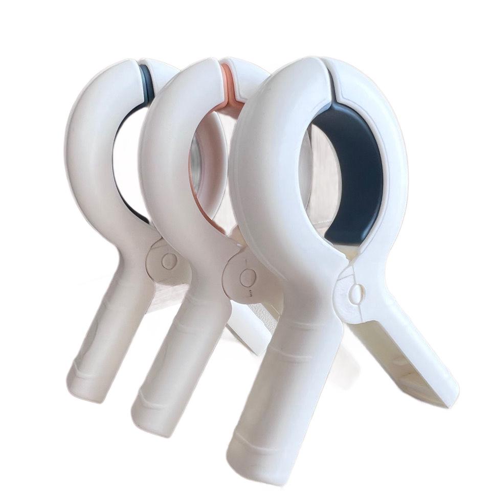 Windproof Multifunctional Clothes Peg: Quilt Drying Clip, Mosquito Net, and Sock Holder.
