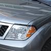 Glossy Piano Black Headlight Eyebrow Trim Sticker for Nissan Frontier 2009-2017