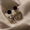 Elegant Gold-Plated Black Zircon Stud Earrings - Niche Design for a Luxurious Fashion Statement