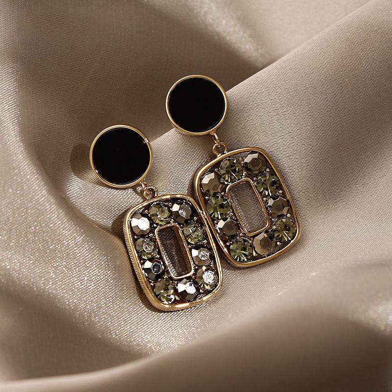 Elegant Gold-Plated Black Zircon Stud Earrings - Niche Design for a Luxurious Fashion Statement
