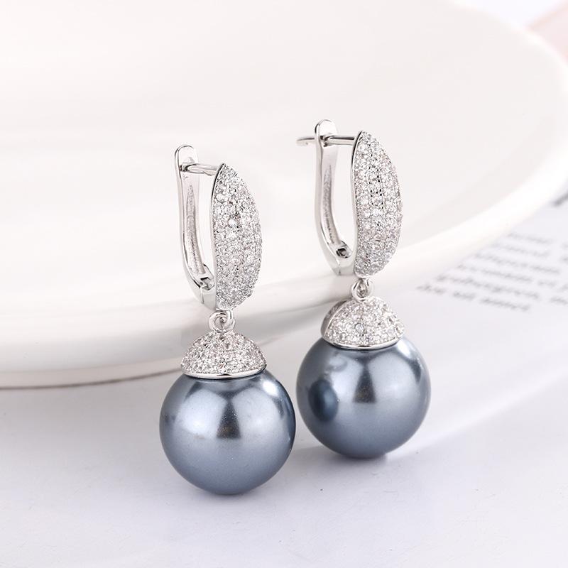 

Ювелирные изделия Медное основание Позолоченные Жемчужные серьги Серьги-гвоздики Женские 14 мм