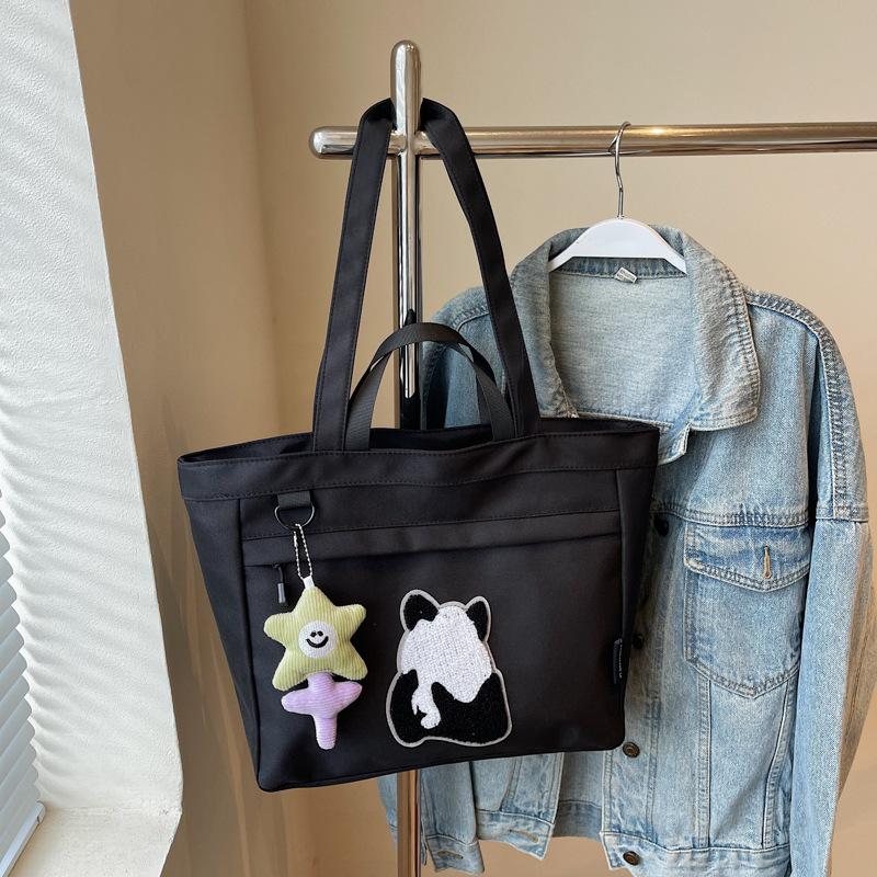Spring canvas large-capacity messenger bag for women 2025 new trendy cartoon panda print shoulder tote handbag for women