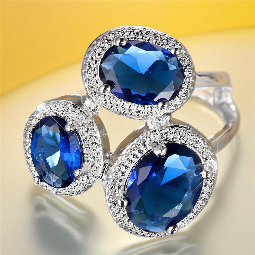 Süße Damen blaue Zirkonstein Silberfarbe Hochzeit Versprechen Verlobung Weizenringe für Frauen