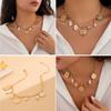 Stylish Gold Crosses Necklace for Women with Seashells Charm Decoration for Beach and Summer Fashion Statement Pieces