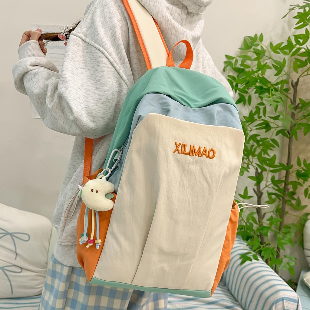Schoolbag large-capacity contrasting color student schoolbag 1011 winter new trendy Korean version fashion travel lightweight high-value backpack
