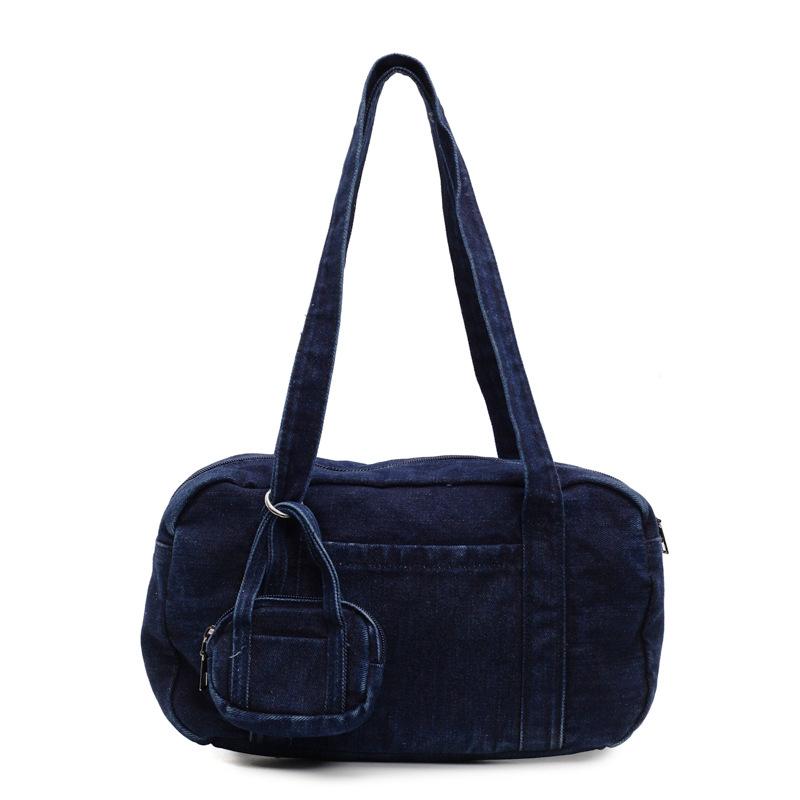 

Korean niche casual denim women s bag 2025 summer new fashion portable satchel simple pillow bag темно-синий