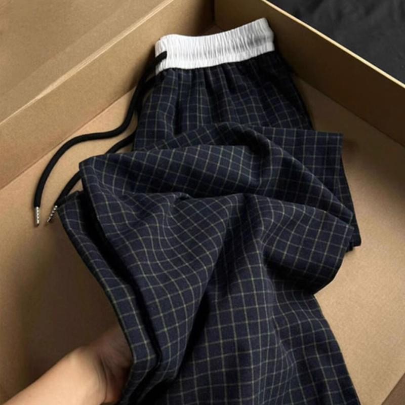 

Женские брюки широкие ретро в весеннюю клетку темно-синего цвета 2025 L темно-синий