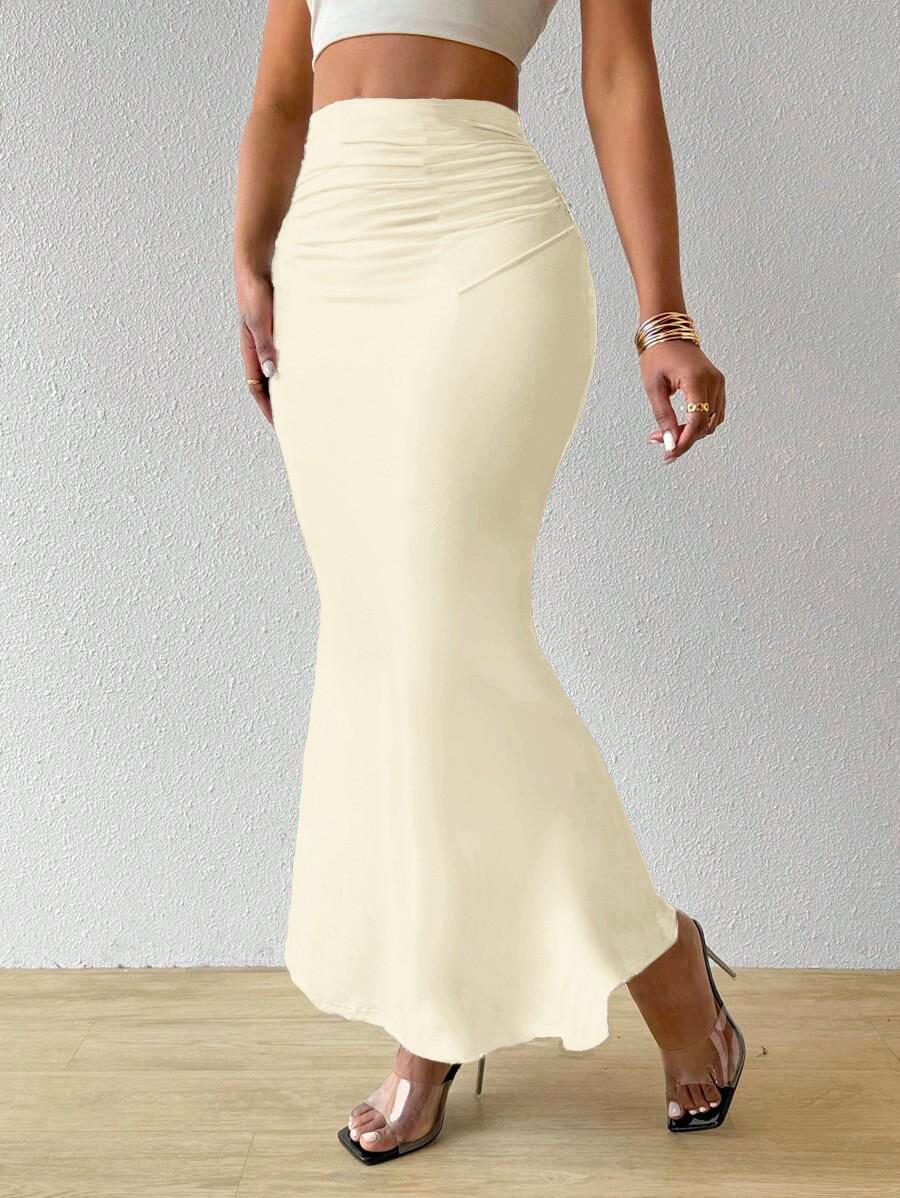 

Женская однотонная облегающая юбка с завышенной талией и модным рыбьим хвостом XL бежевый
