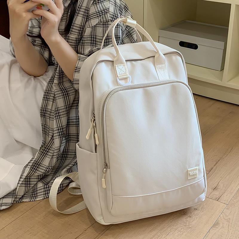 Handbag for primary school students, girls, junior high school students, new solid color backpack