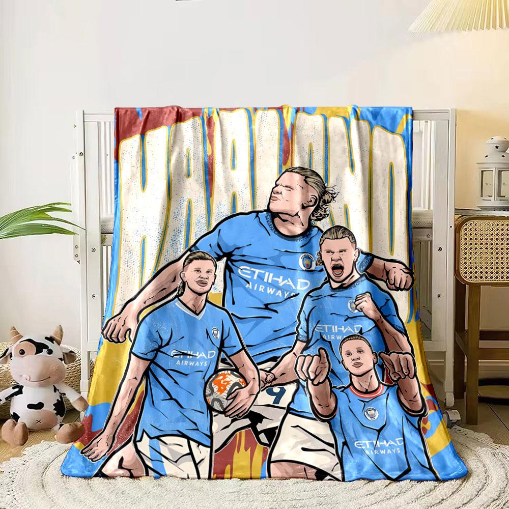 Group of athletes in blue jerseys with bold text and vibrant backdrop. for all seasons blanket lunch break throw gift