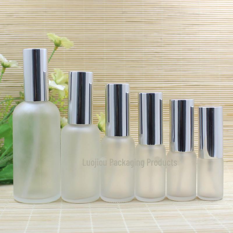 Frosted Glass Essential Oil Bottle with Silver Spray