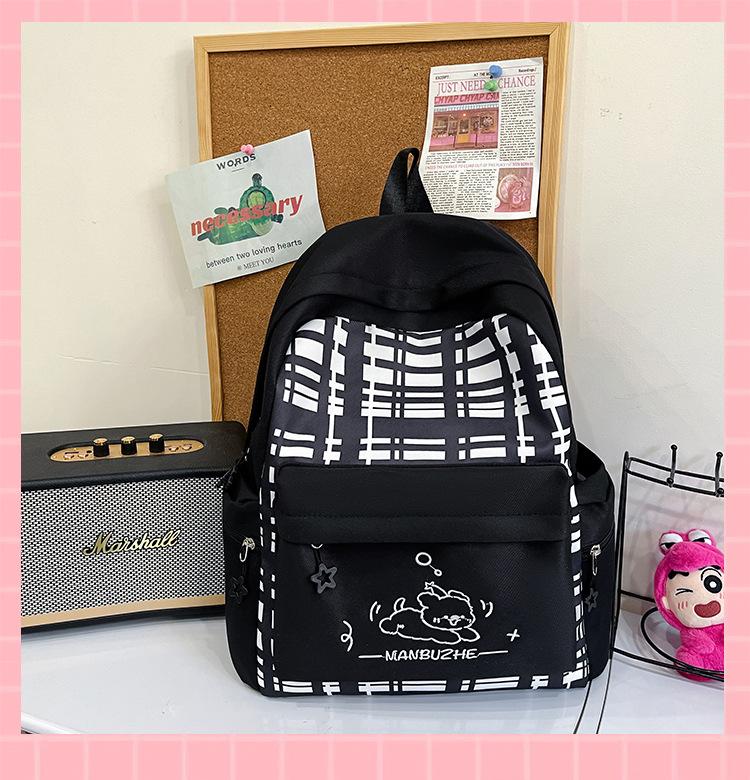 Schoolbag New Japanese plaid schoolbag for women, junior high school students Large capacity, light and wear-resistant cute cartoon backpack