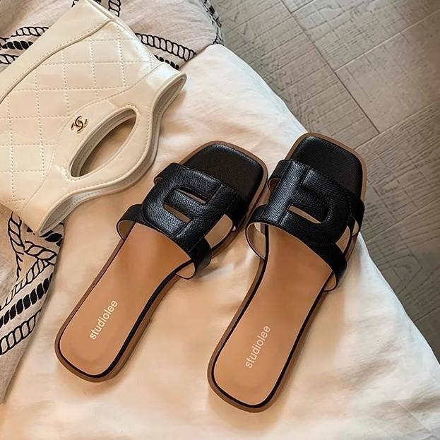 hollowed out and thin square head soft bottom versatile flat bottom one word beach wear leather slippers female summer
