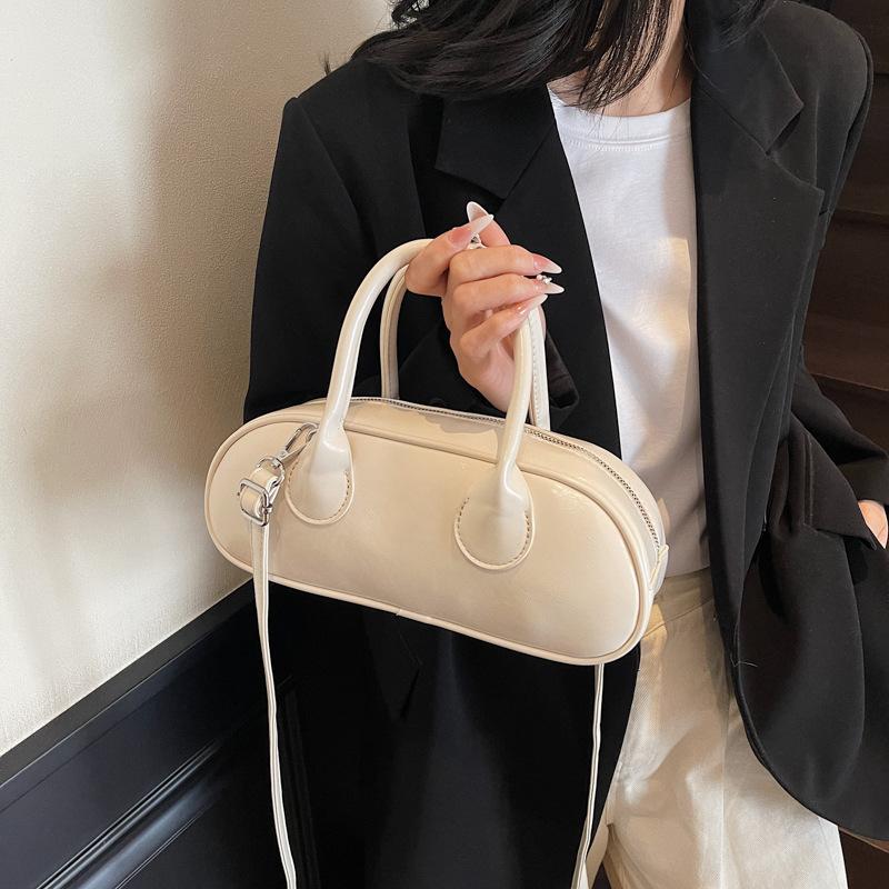 New niche high-end sense simple solid color personality versatile fashion portable messenger women's bag