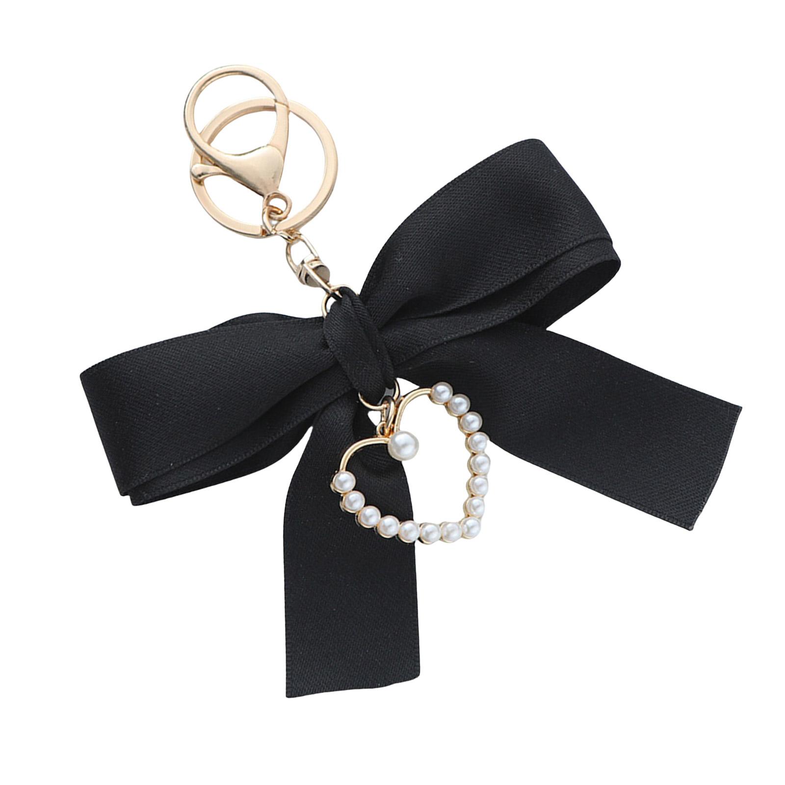 

Fashionable Pearls Heart Shaped Pendant Keychain with Ribbon Bowknot Perfect For Young Girls Seeking Unique Accessories чорний