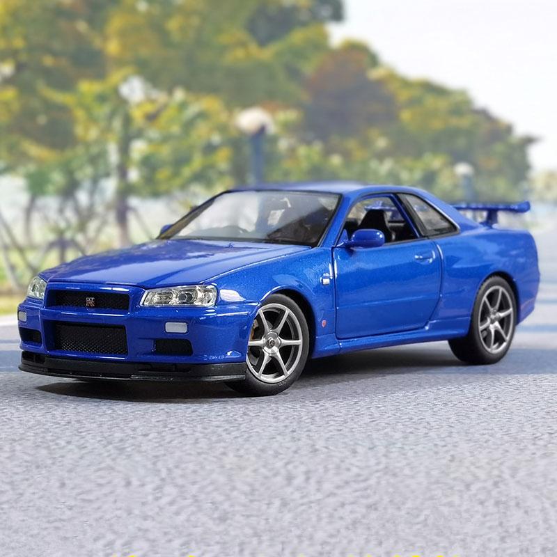 Welly 1/24 Nissan Skyline GTR R34 Alloy Sports Car Model Diecasts Metal Racing Car Vehicles Model Simulation Childrens Toys Gift