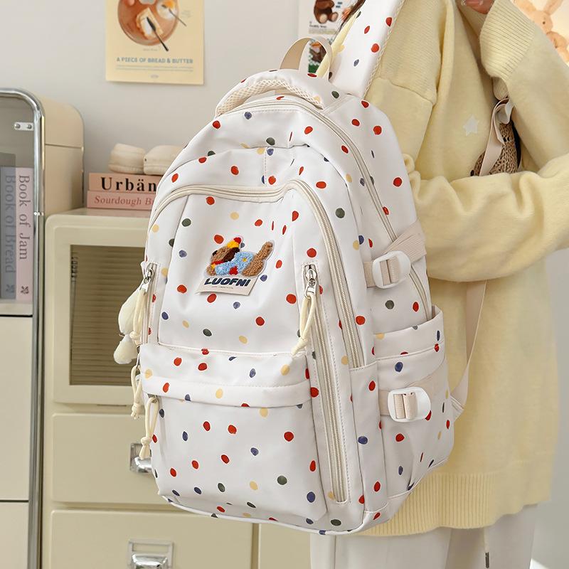 New junior high school backpack female junior high school schoolbag ins niche polka dot cute large-capacity backpack