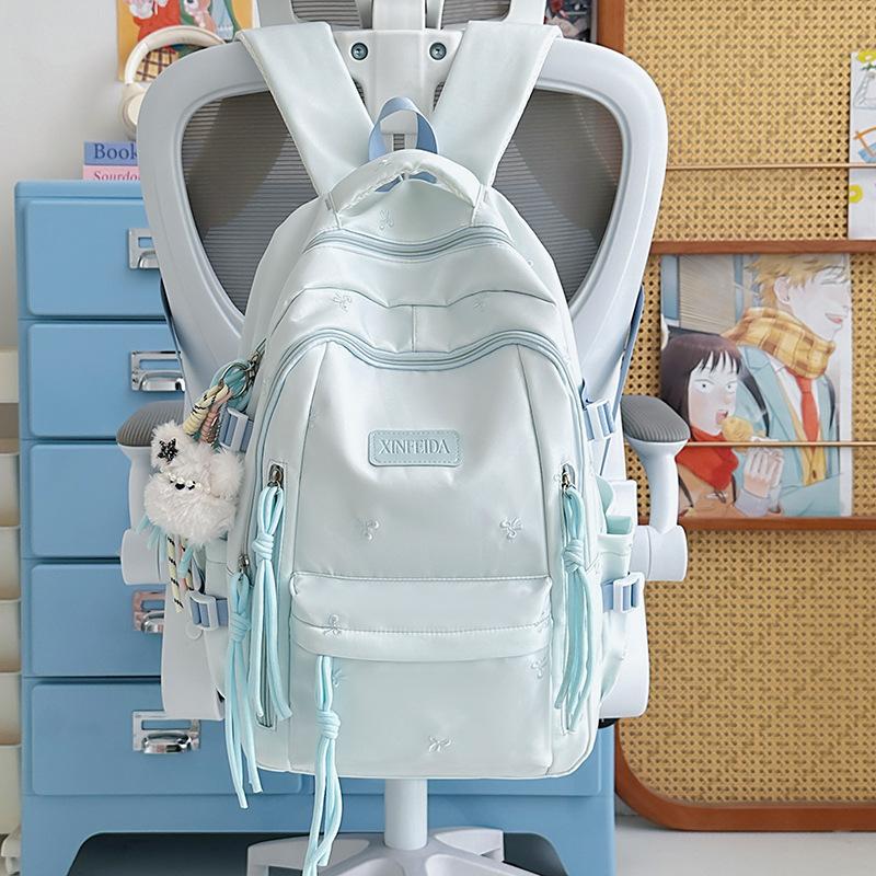 Schoolbag custom cute bow backpack student tutoring bag lightweight 1-1 grade three-piece backpack burden reduction