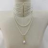 Elegant Multilayer Pearls Tassels Necklace Featuring Stylish Pearls and Gold Chain for Trendy Women Casual Wear