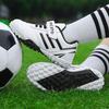Foreign trade children's football shoes training shoes boys and girls primary and secondary school students kindergarten special broken nail TF spike