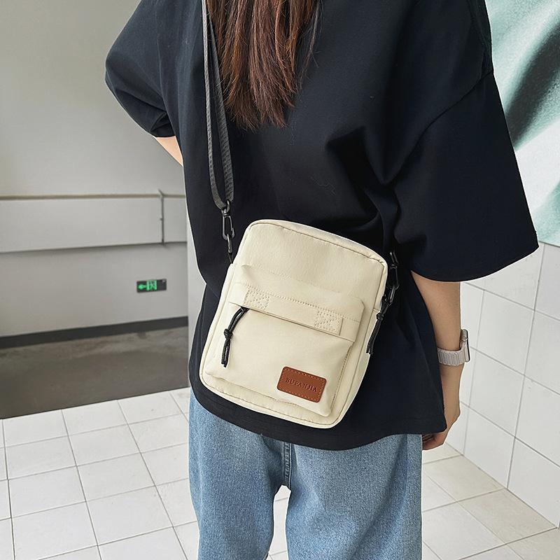 Summer senior commuting mobile phone crossbody small bag women's new simple canvas couple small square bag