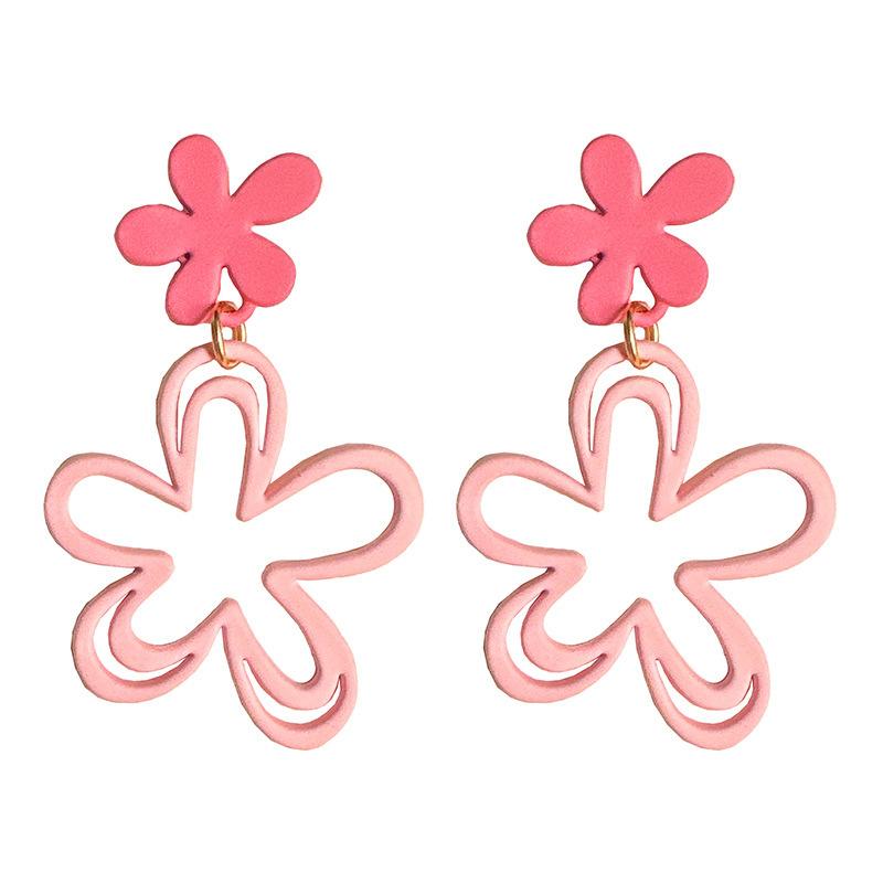 

Pink hollow flower earrings French romantic temperament sweet and gentle stud earrings design sense women s ear hole ear clips розовый