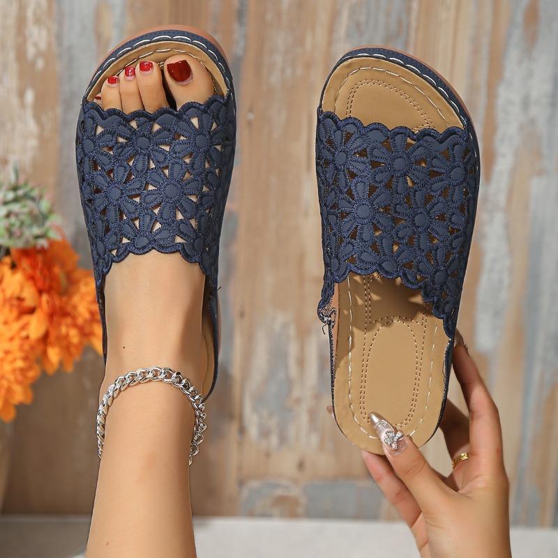 Cross-border foreign trade large size summer new simple casual flower hollow PU medium heel women's wedge heel slippers