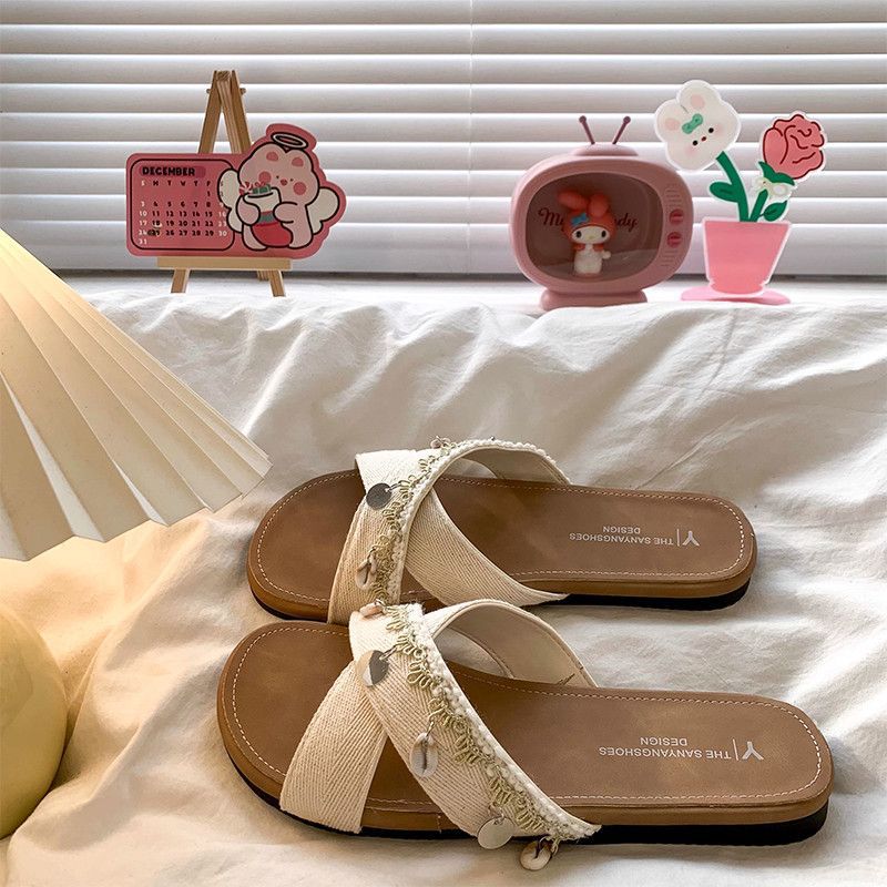 

Flat bottom cross with cool slippers women s summer wear new seaside vacation one-word drag casual with skirt sandals 35