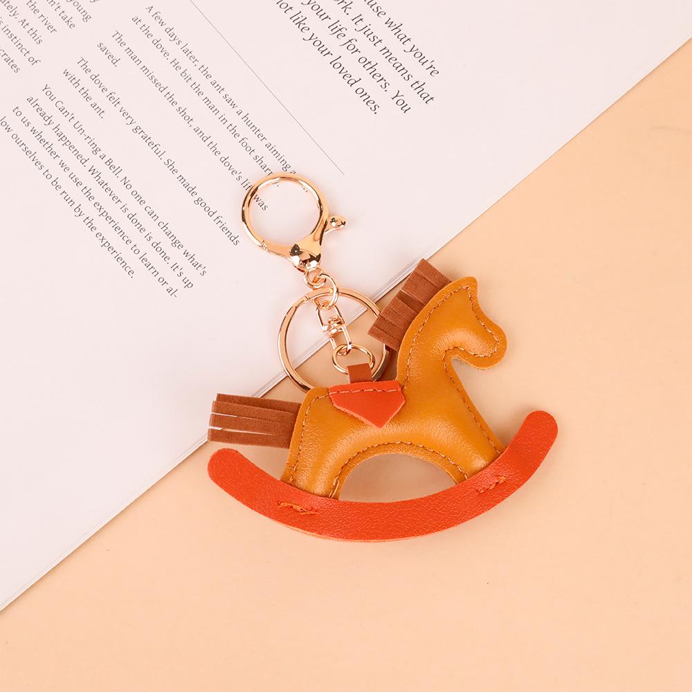 

Cross New PU Leather Horse Pendant: European & American Fashion Keychain
