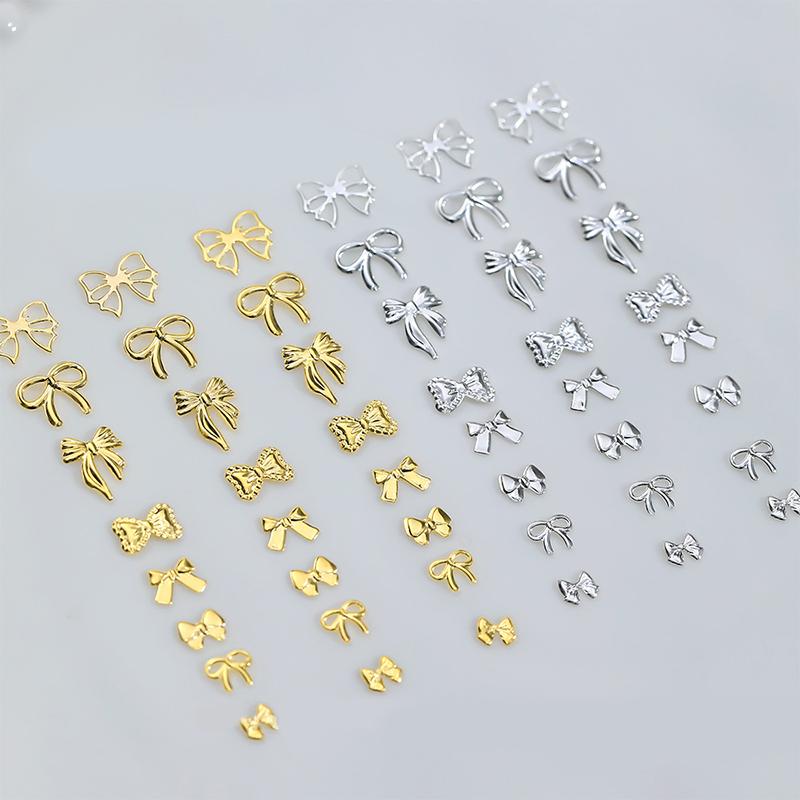 50 st Metalllegering Rosett Naglar Konst Dekoration Silver Guld Nagelberlocker DIY Manikyr Design Smyckestillbehör Verktyg