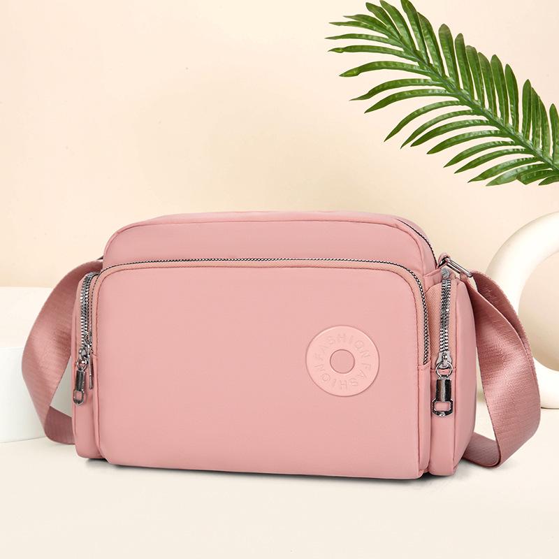 

Женская большая водонепроницаемая нейлоновая сумка через плечо и на плечо розовый