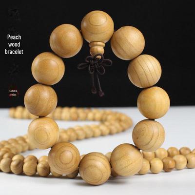 Bracciale con Grani Buddisti in Legno di Pesco: Accessorio Culturale e Artistico a 108 Grani