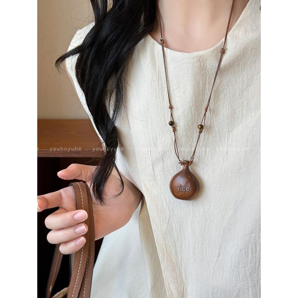 2025 Nowy Damski Naszyjnik z Sandalowego Krzyża i Flaszeczki z Koralikowym Sznurkiem