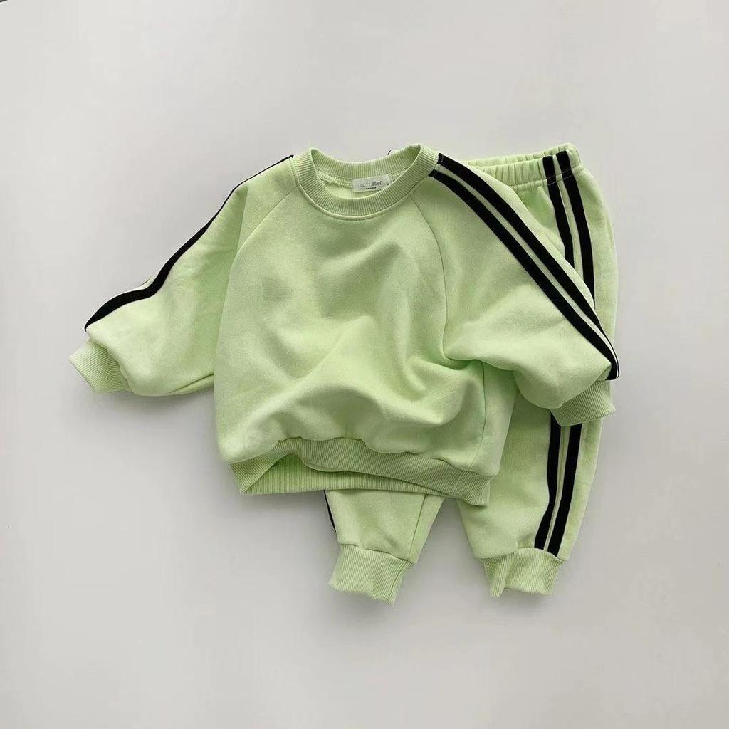 Korean-Style Unisex Baby Sweatshirt and Pants Set - Solid Color with Webbing Stripe Patchwork for Autumn and Spring.