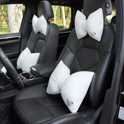 Oreiller de cou pour appui-tête de voiture avec nœud brodé de dessin animé: Accessoire d'intérieur de voiture élastique, respirant et élégant.